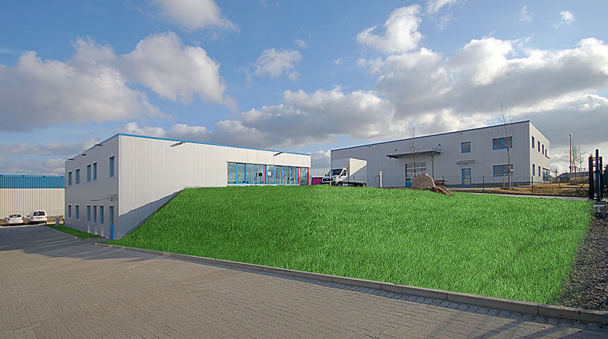 Außenansicht des neuen Betriebsgebäudes mit Lagerhalle der Firma C. W. Hoffmeister VITAL GmbH