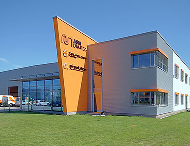 Außenansicht des Betriebsgebäudes der ASM Dimatec Deutschland GmbH.